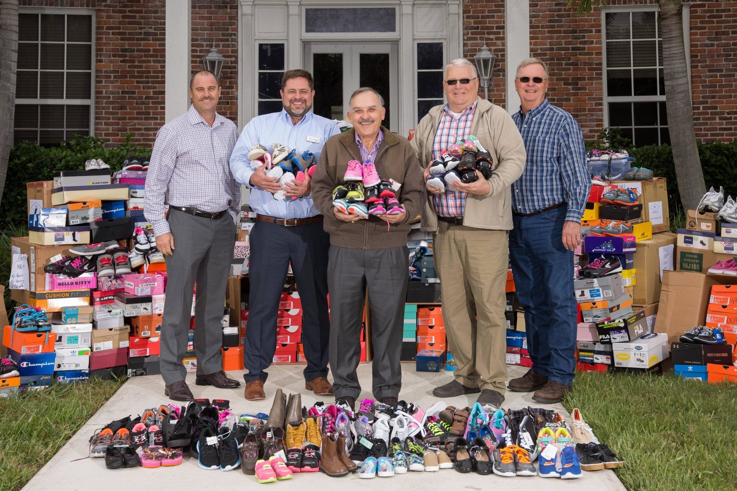 From left to right, Hendry County School Board Member and Vice Chair, John Basquin; Glades County Schools Superintendent Scott Bass; U.S. Sugar President and CEO Robert H. Buker Jr.; Hendry County Schools Superintendent Paul Puletti; Glades County School Board Member Mike Pressley.