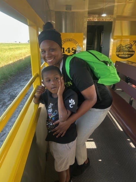 Woman with child on train