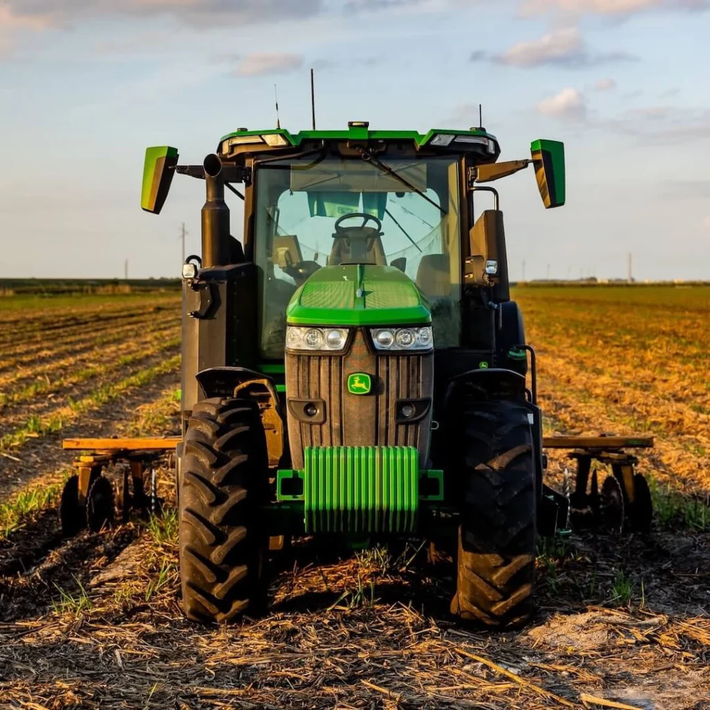 Tractor in crop field