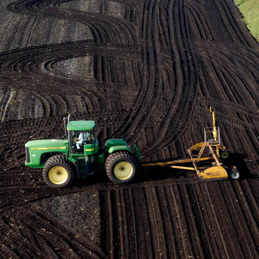 Tractor in field laser leveling