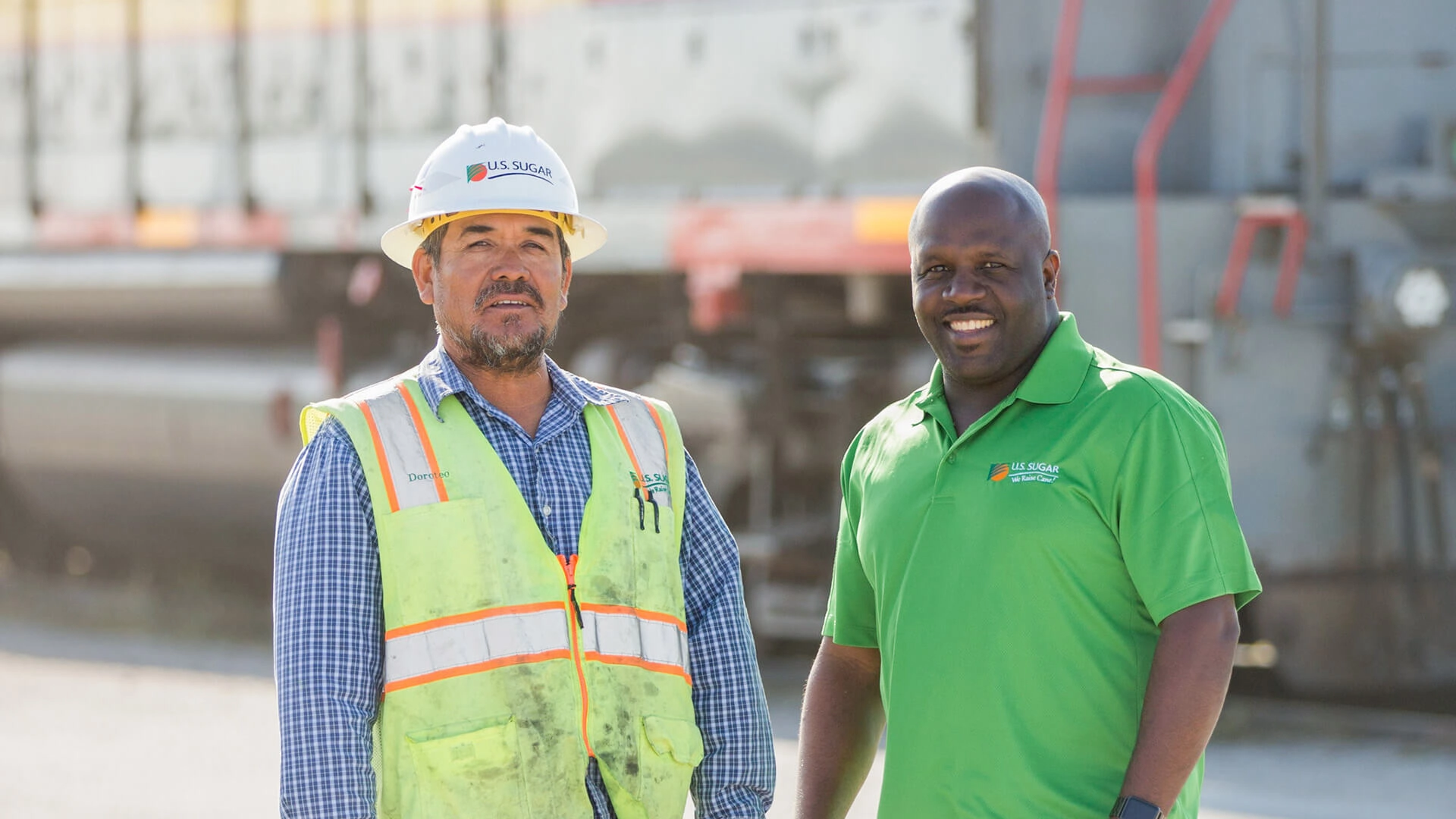 Two employees standing together