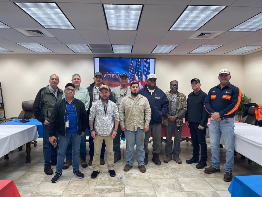 U.S. Sugar employees who are veterans gather together to celebrate Veterans Day