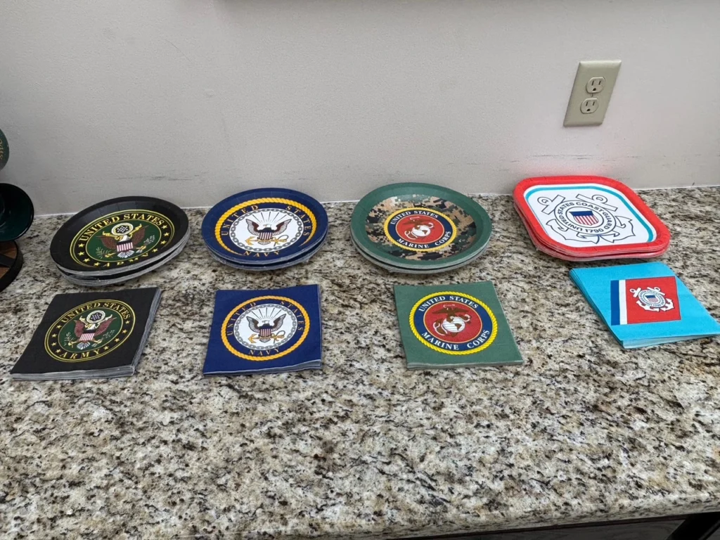 U.S. Sugar plates and napkins with military symbols.