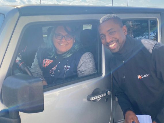 U.S. Sugar team member supports teachers through a corporate education partnership delivering classroom supply donations to local Palm Beach County schools.